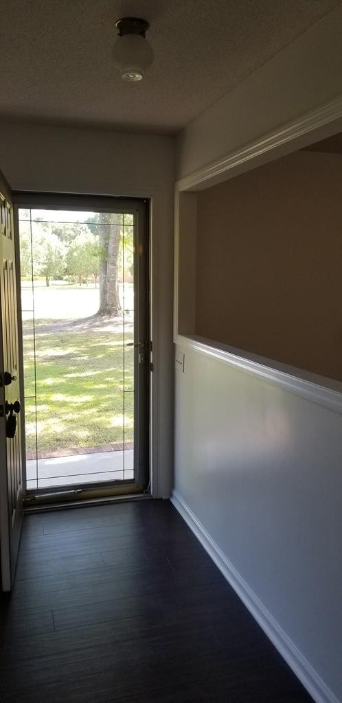 Separate foyer entry but open and airy.