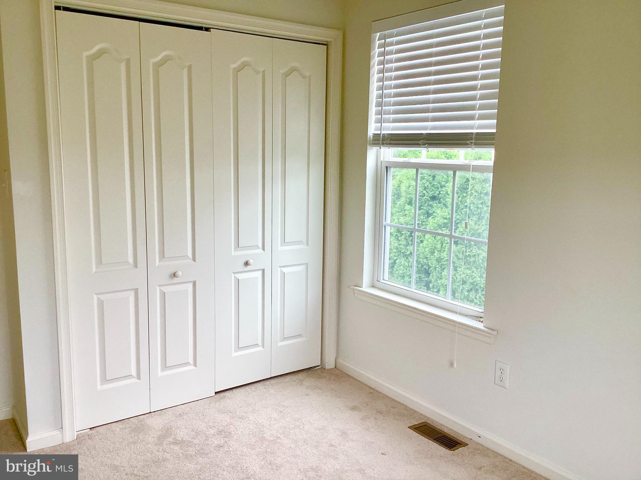 140 Pumpkin Patch Lane Hockessin, DE 19707 - Photo 18 of 25 a view of an empty room with a window