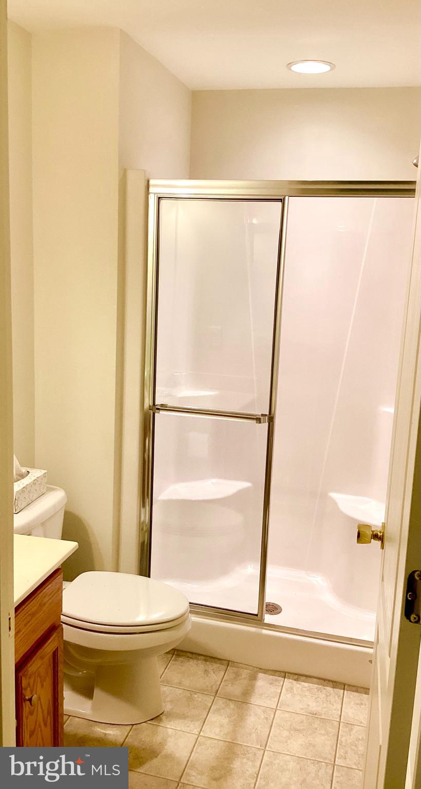 140 Pumpkin Patch Lane Hockessin, DE 19707 - Photo 5 of 25 a bathroom with a toilet and a shower