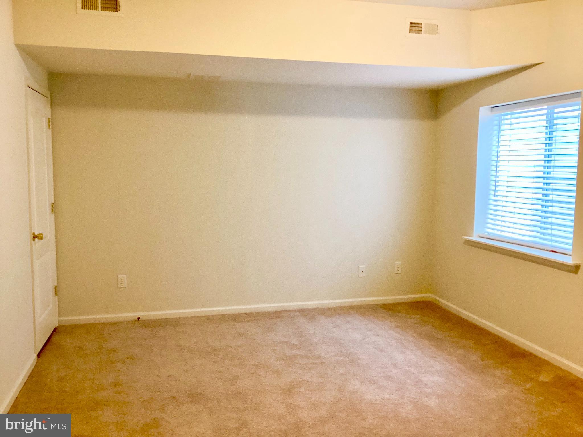 140 Pumpkin Patch Lane Hockessin, DE 19707 - Photo 6 of 25 a view of an empty room with a window