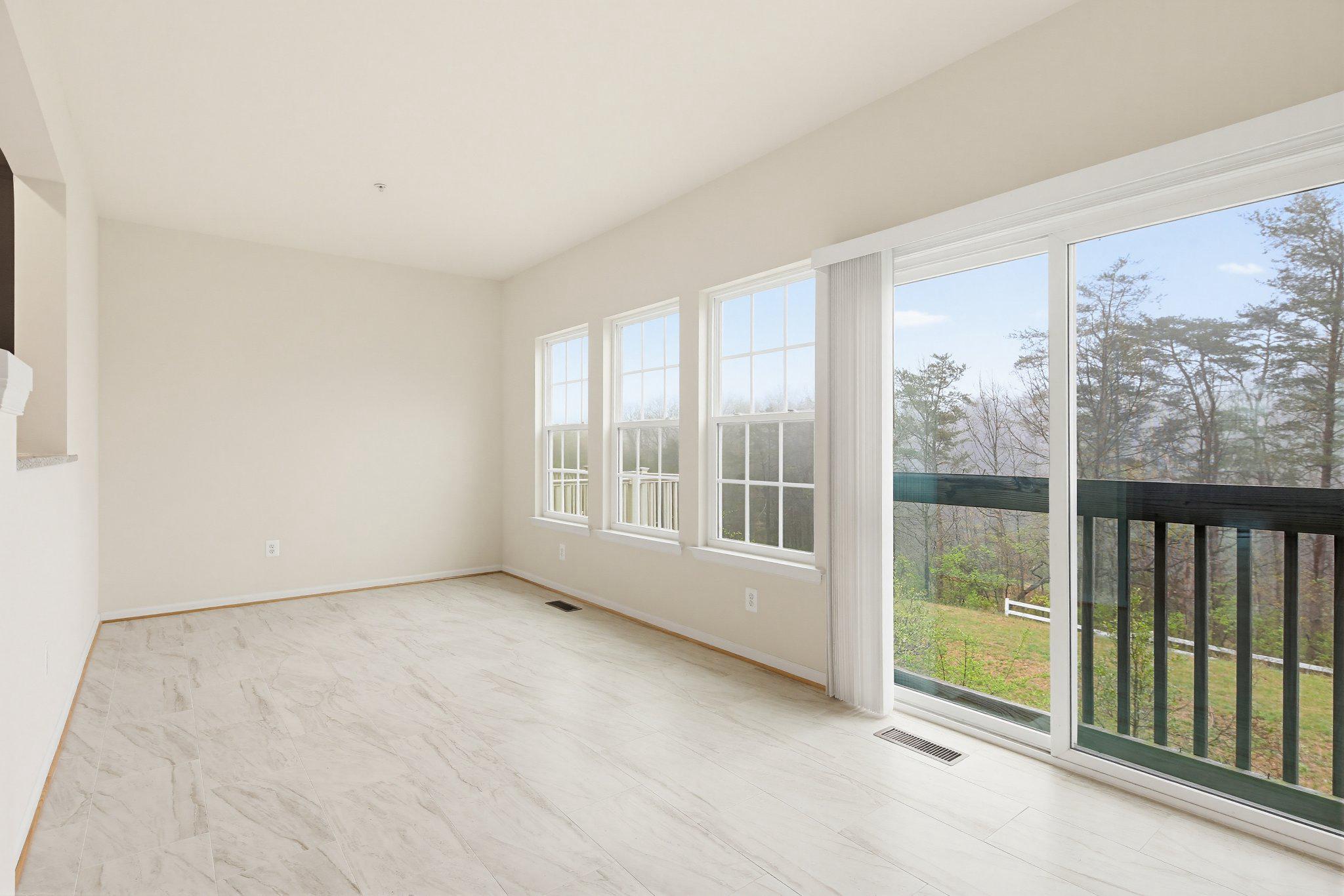 3819 Cullingworth Road Burtonsville, MD 20866 - Photo 13 of 50 a view of an empty room with a window