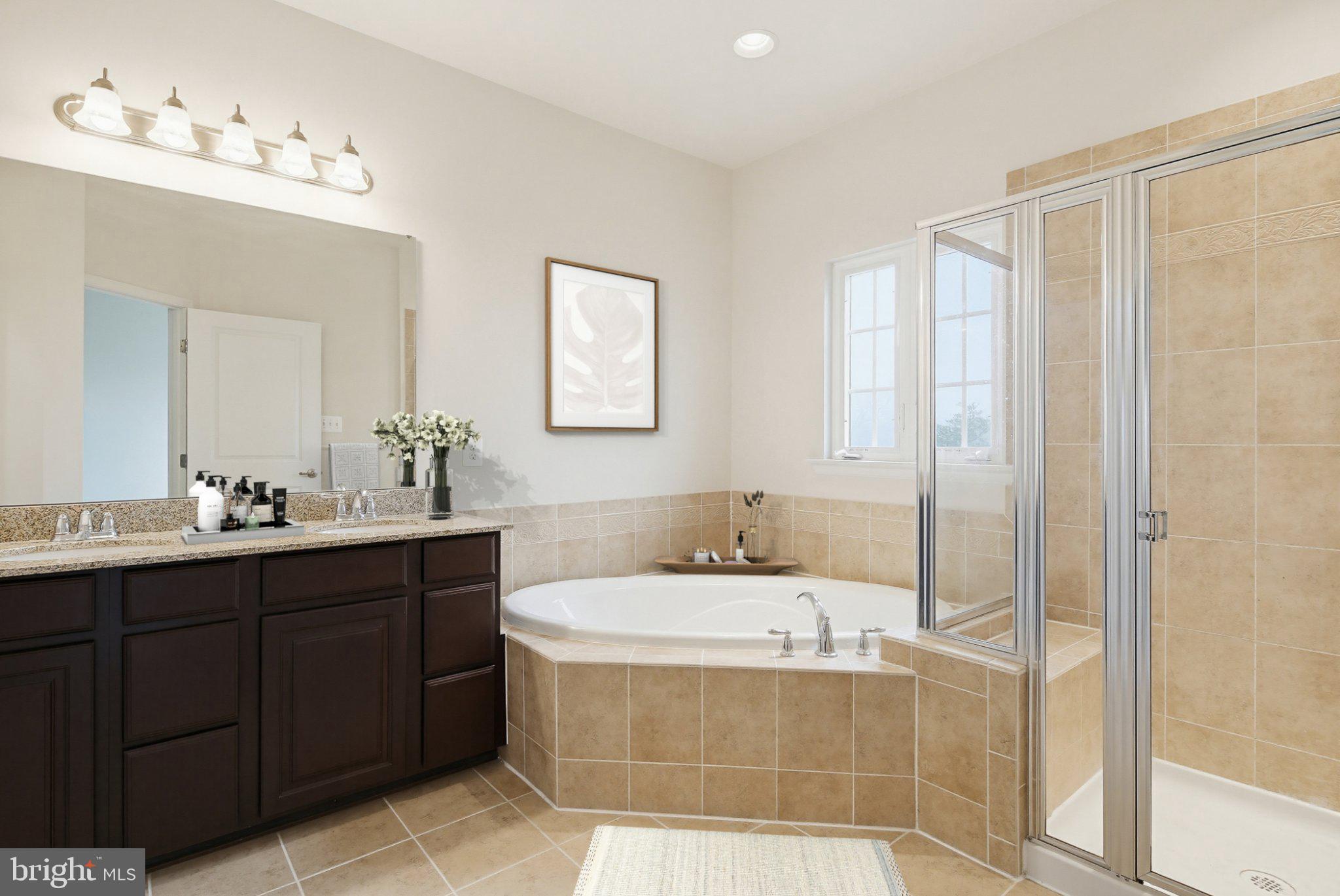 3819 Cullingworth Road Burtonsville, MD 20866 - Photo 26 of 50 a bathroom with a tub sink and mirror