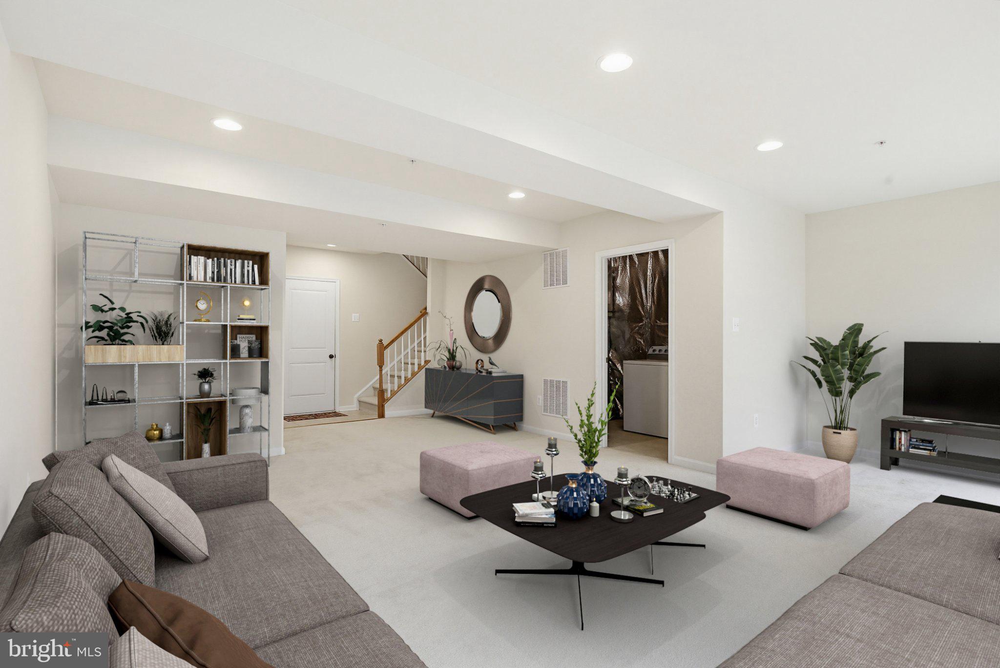 3819 Cullingworth Road Burtonsville, MD 20866 - Photo 36 of 50 a living room with furniture and a flat screen tv