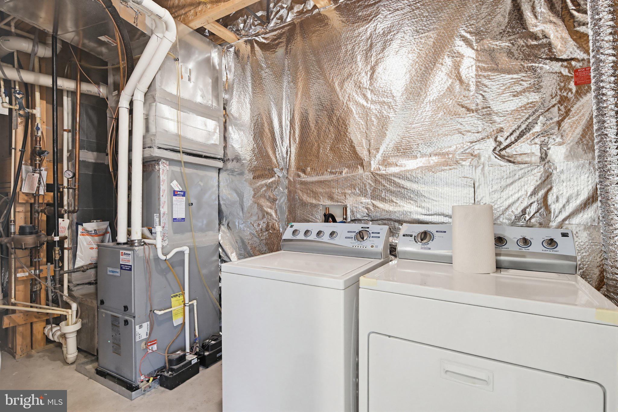 3819 Cullingworth Road Burtonsville, MD 20866 - Photo 42 of 50 a utility room with dryer and washer
