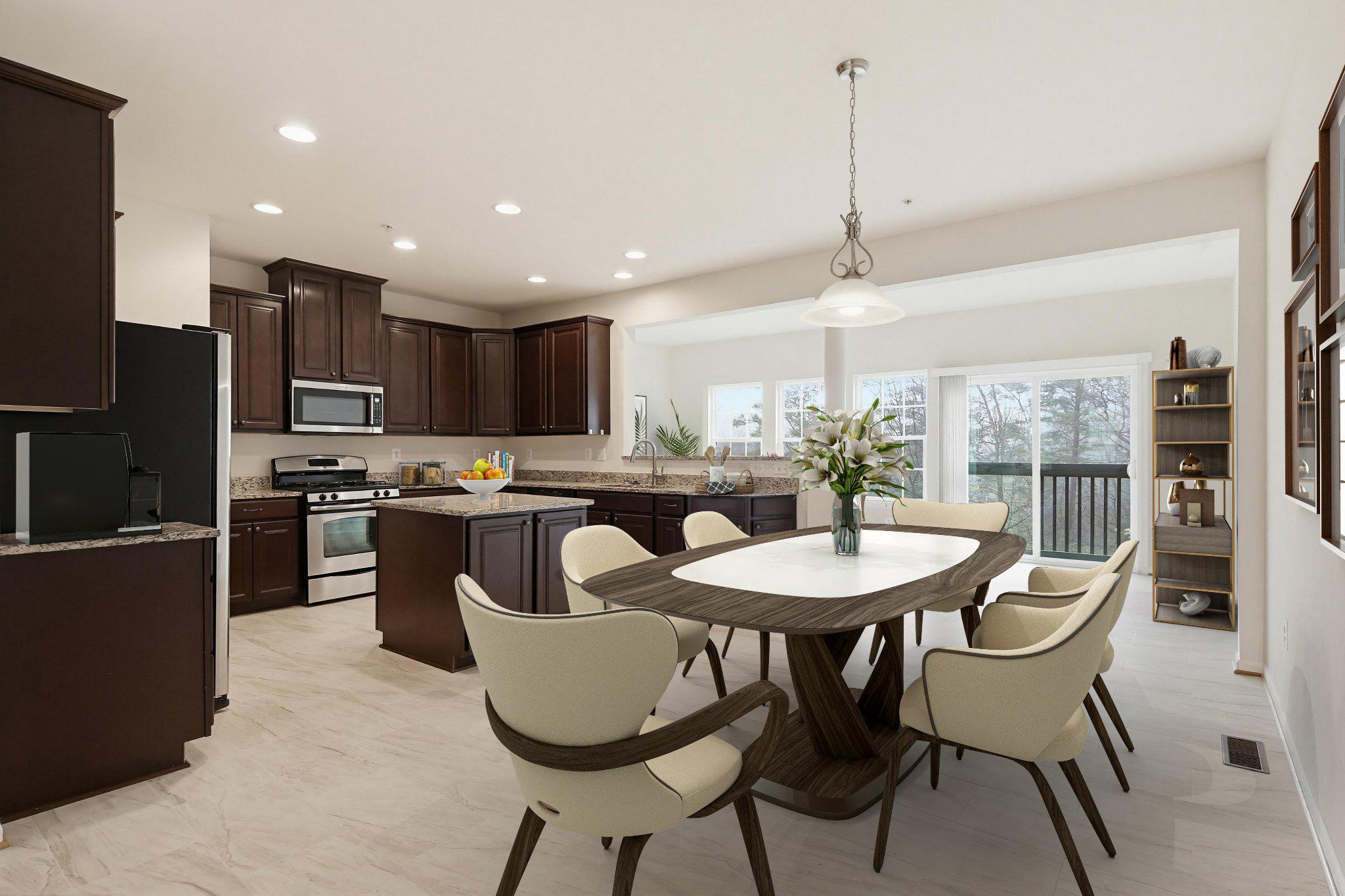 3819 Cullingworth Road Burtonsville, MD 20866 - Photo 8 of 50 a kitchen with stainless steel appliances granite countertop a stove top oven a sink a refrigerator with a dining table and chairs