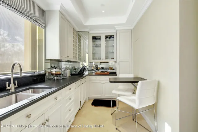 a bedroom with a bed and lamp