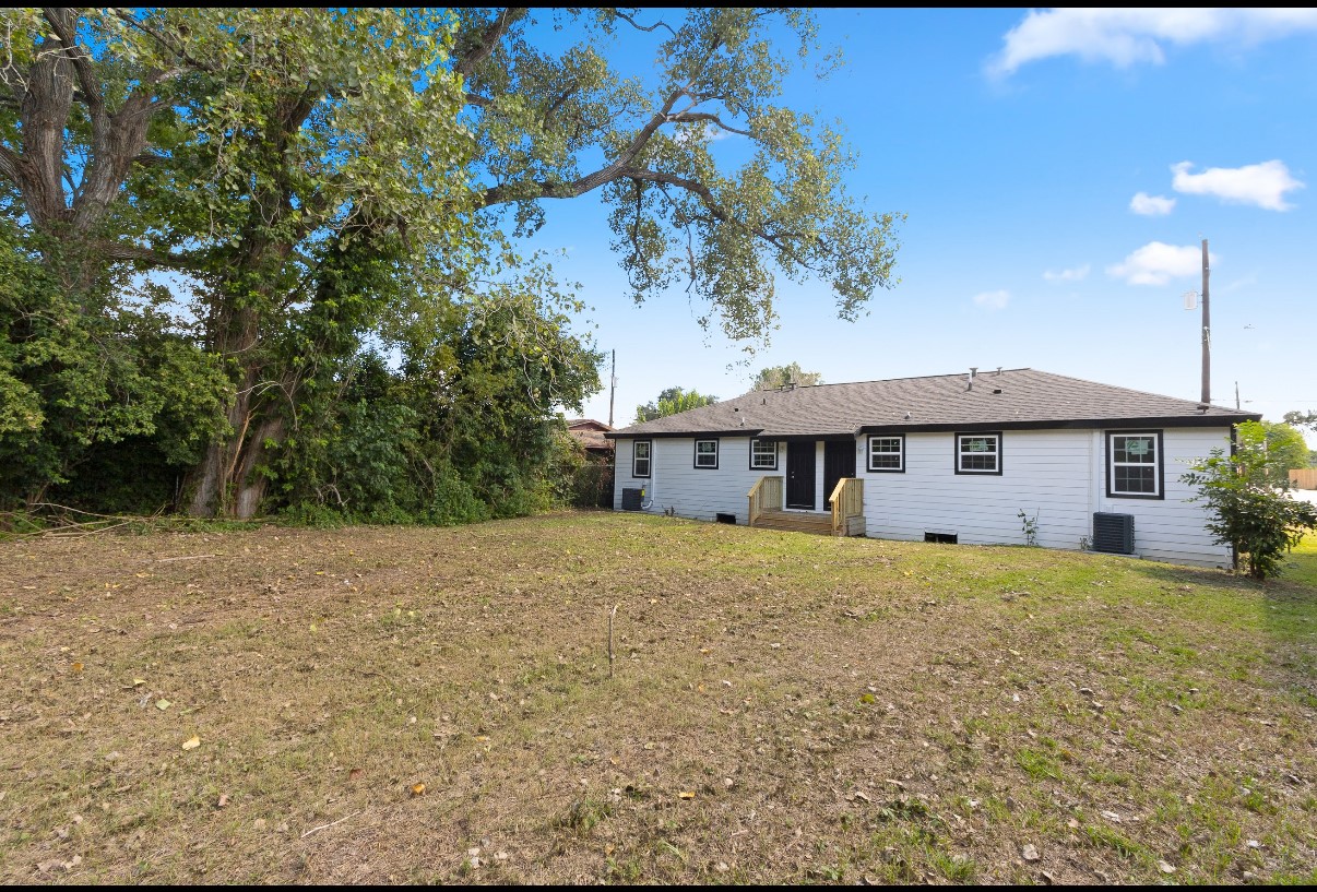 5031 Mallow Street Houston, TX 77033 - Photo 11 of 11 a front view of a house with a yard