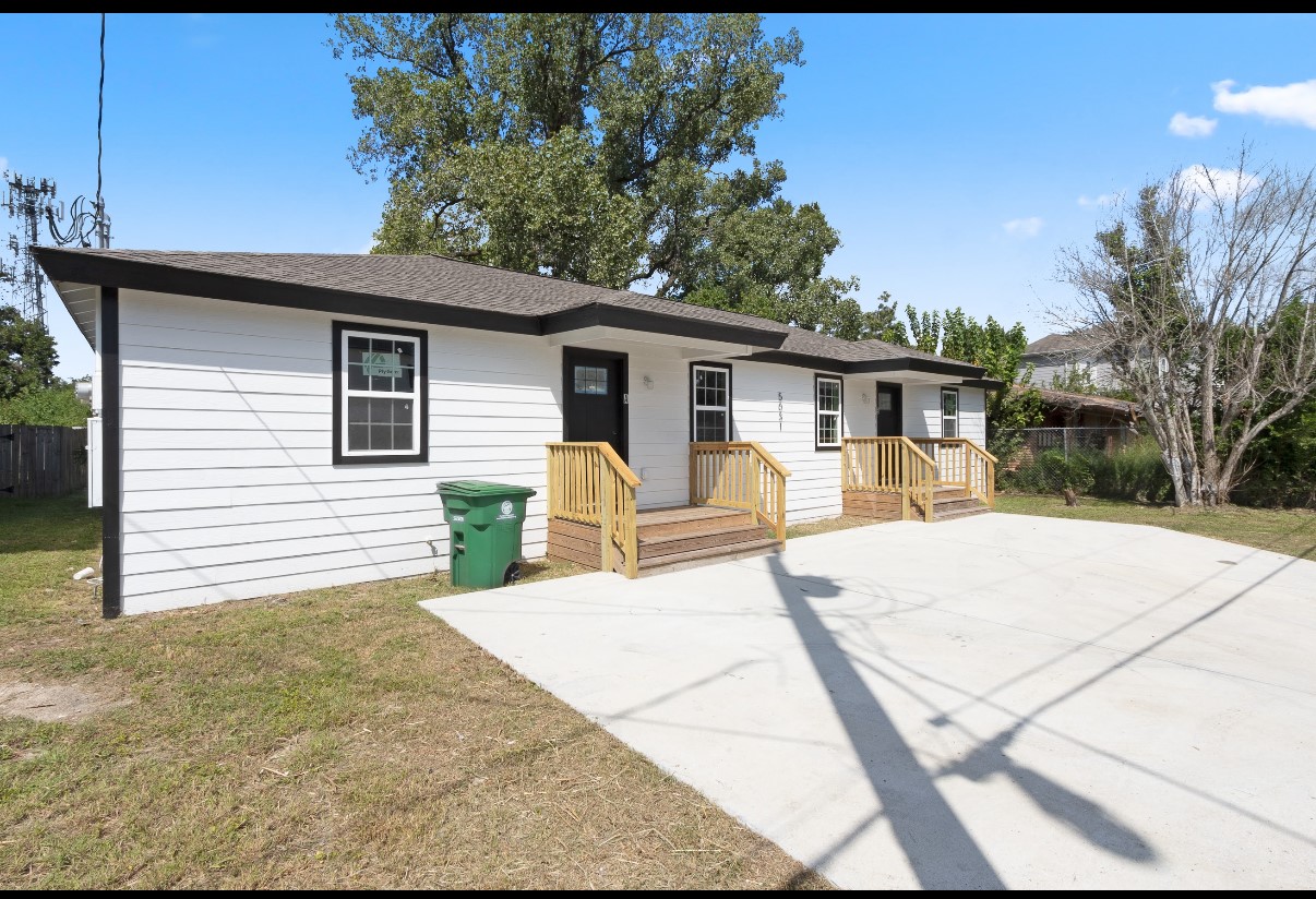 5031 Mallow Street Houston, TX 77033 - Photo 2 of 11 a view of a house with a patio