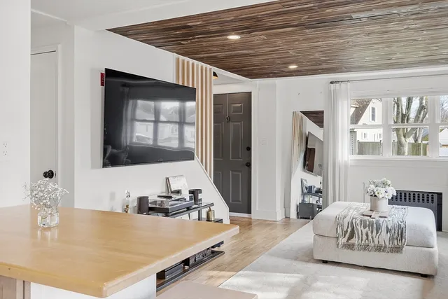 a living room with a bed