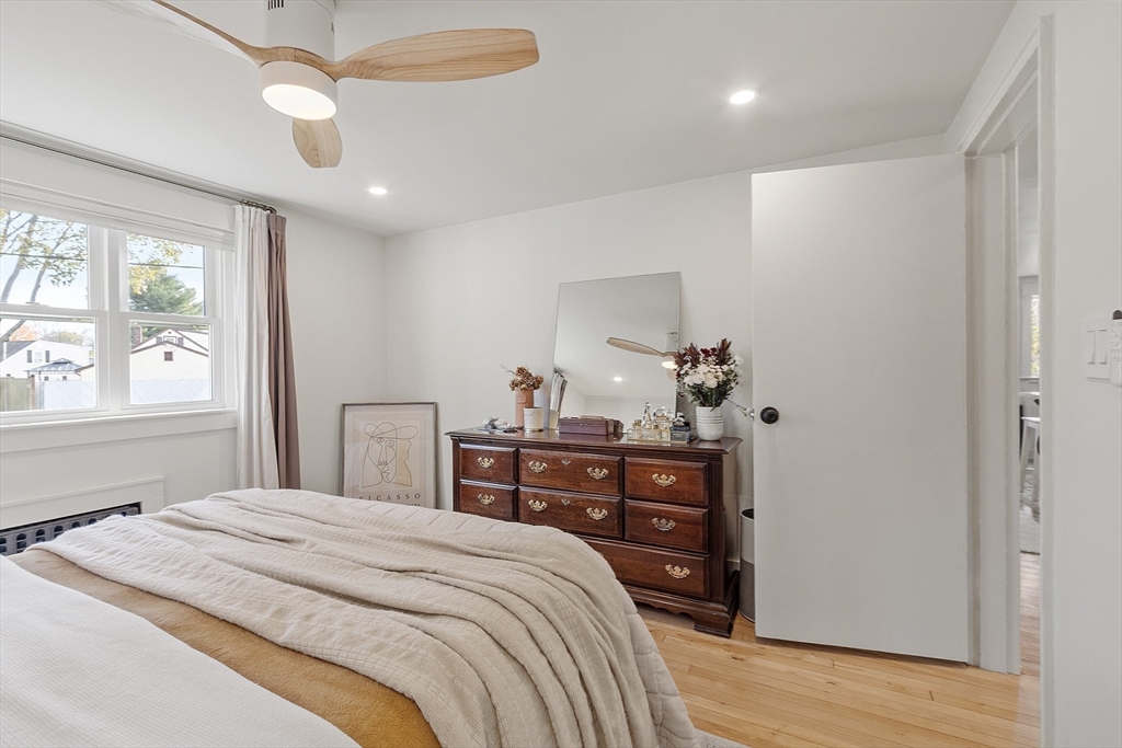 2 Summit Terrace Peabody, MA 01960 - Photo 19 of 39 a bedroom with a bed and wooden floor