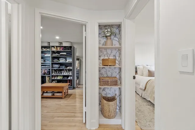 a room with furniture and a book shelf