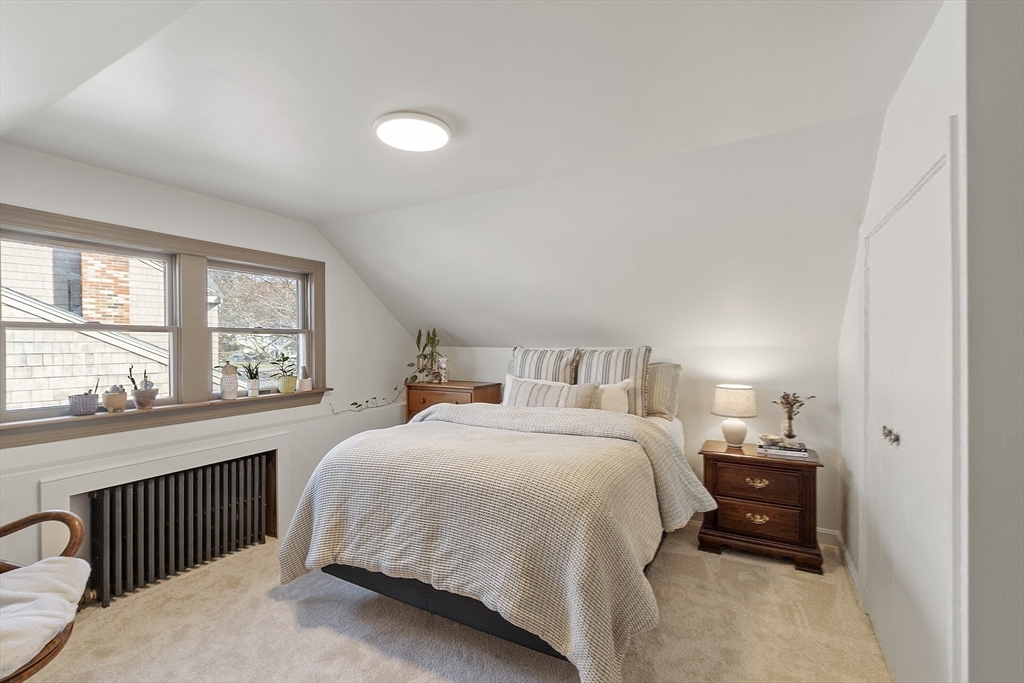 2 Summit Terrace Peabody, MA 01960 - Photo 30 of 39 a bedroom with a bed and a large window