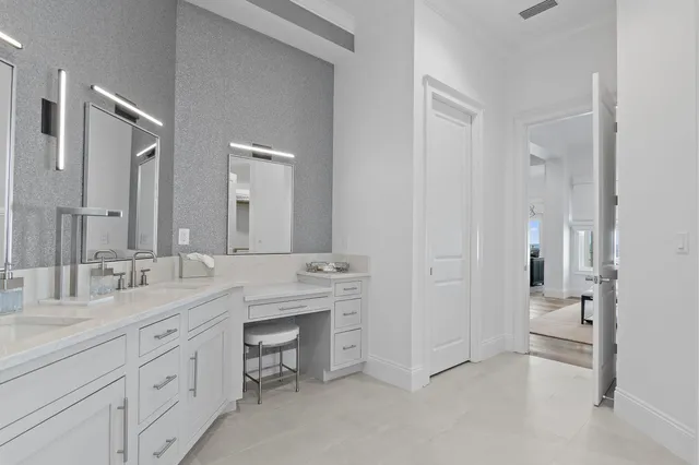 a spacious bathroom with a bathtub and shower