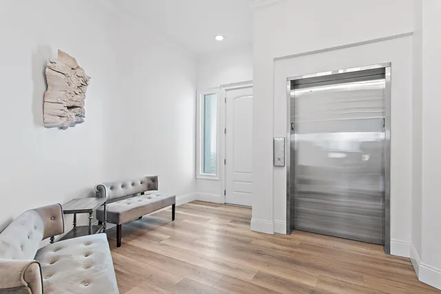 a view of a living room and dining room