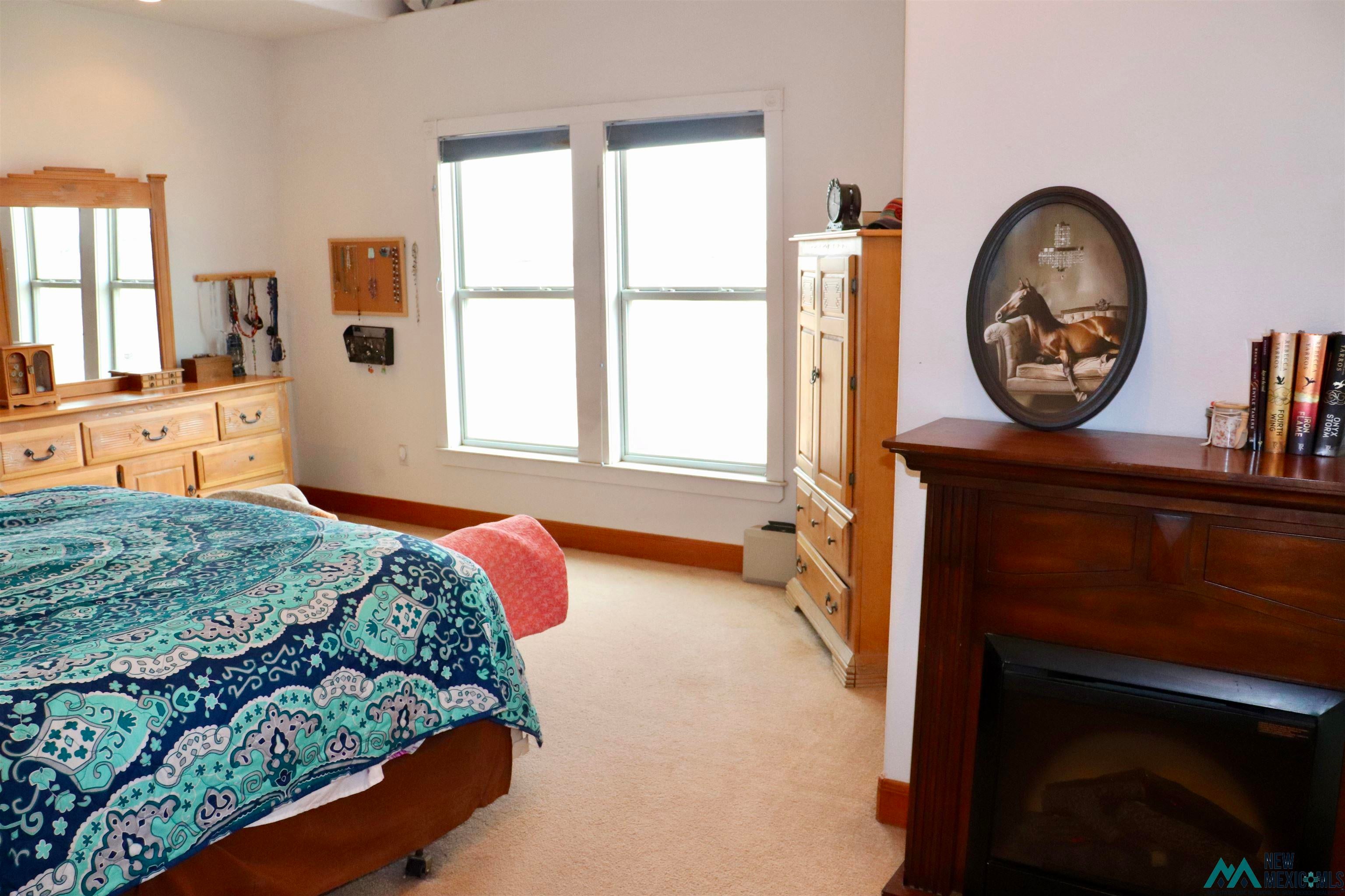 845 South Roosevelt Road South Portales, NM 88130 - Photo 23 of 47 Bedroom with baseboards and light colored carpet