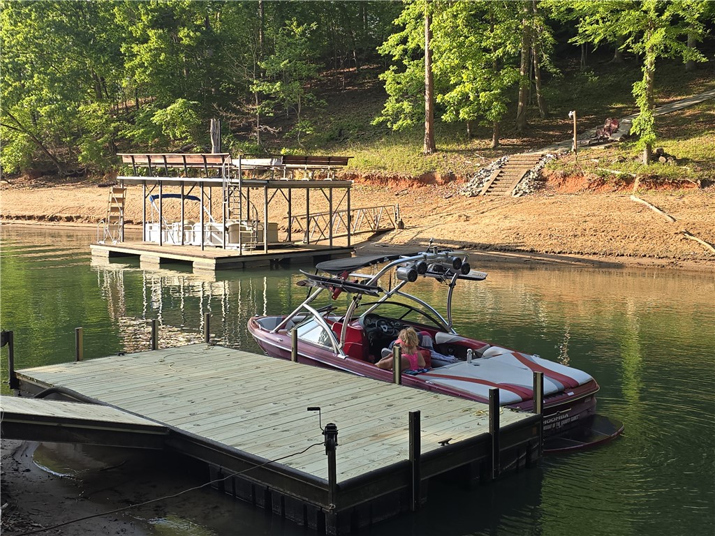 5 Shelor Ferry Road Fair Play, SC 29643 - Photo 13 of 17 This serene lakefront property offers private dock access and a tranquil setting.