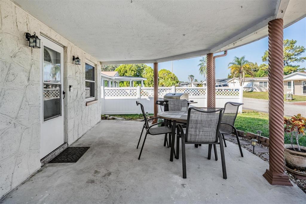 3608 Umber Road Holiday, FL 34691 - Photo 2 of 20 a view of a dining room with furniture window and outside view