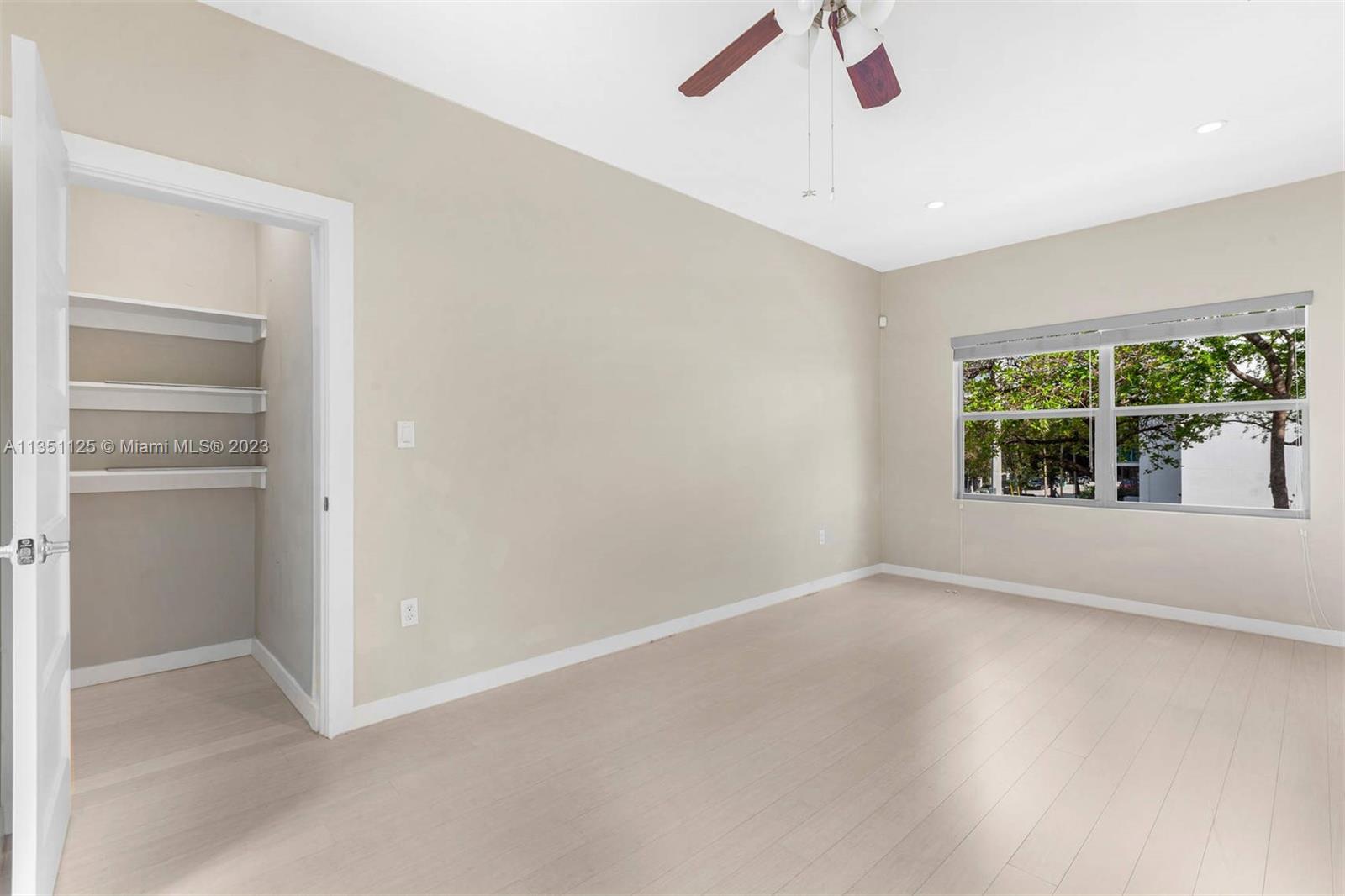 2423 Biscayne Boulevard, Unit 2 Miami, FL 33137 - Photo 11 of 14 a view of an empty room with a window