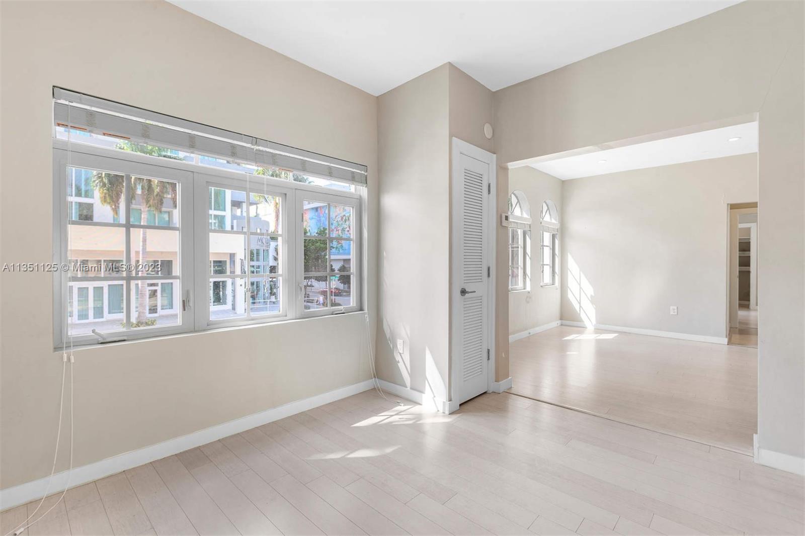2423 Biscayne Boulevard, Unit 2 Miami, FL 33137 - Photo 6 of 14 a view of an empty room with a window