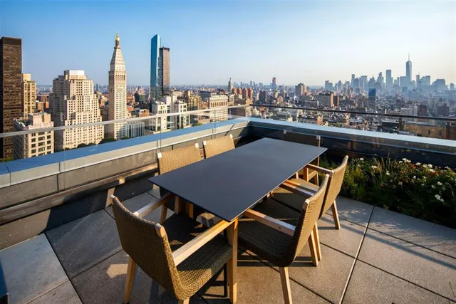 a view of a terrace with sitting area