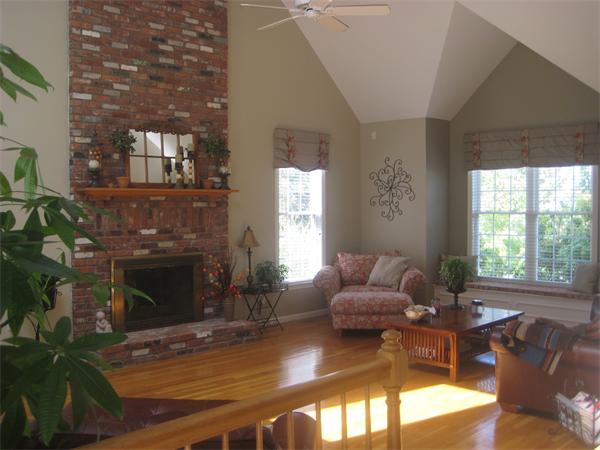 33 Pennock Road Ashland, MA 01721 - Photo 5 of 14 a living room with furniture window and a fireplace