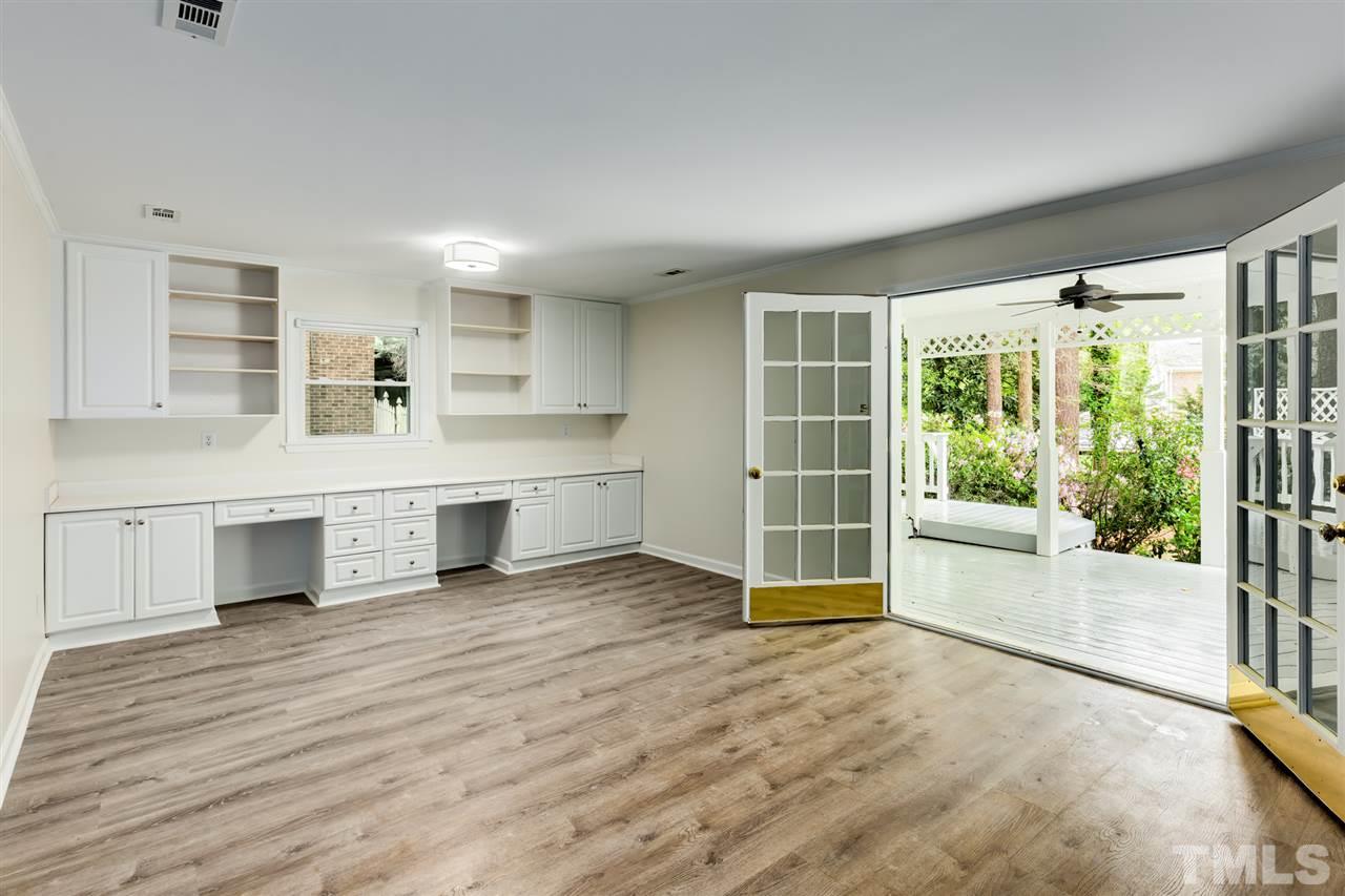 6820 Rainwater Road Raleigh, NC 27615 - Photo 11 of 22 a view of kitchen with furniture and large window