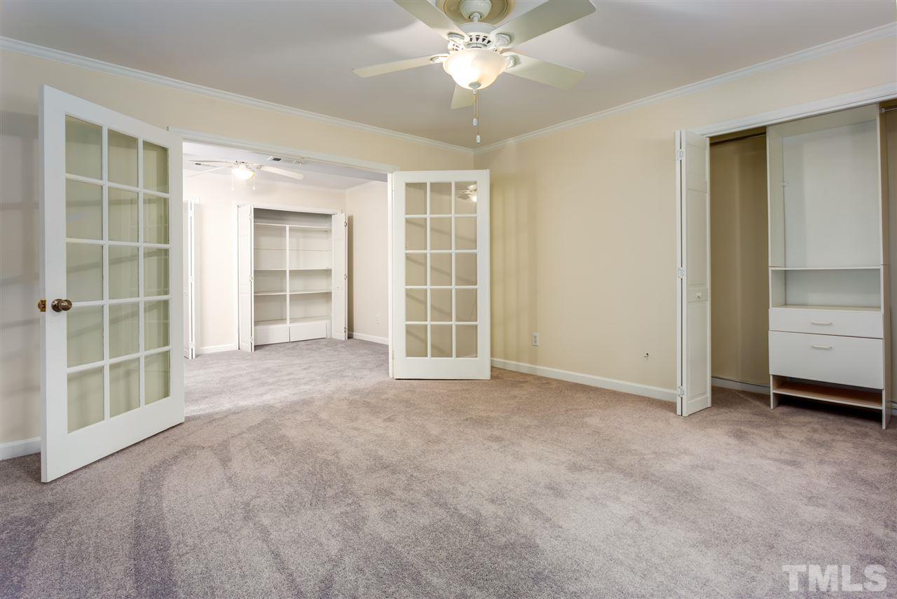 6820 Rainwater Road Raleigh, NC 27615 - Photo 16 of 22 a view of an empty room with a window