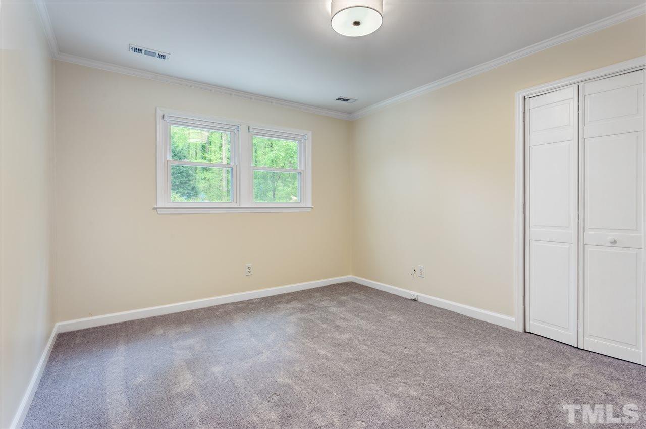 6820 Rainwater Road Raleigh, NC 27615 - Photo 17 of 22 an empty room with a window