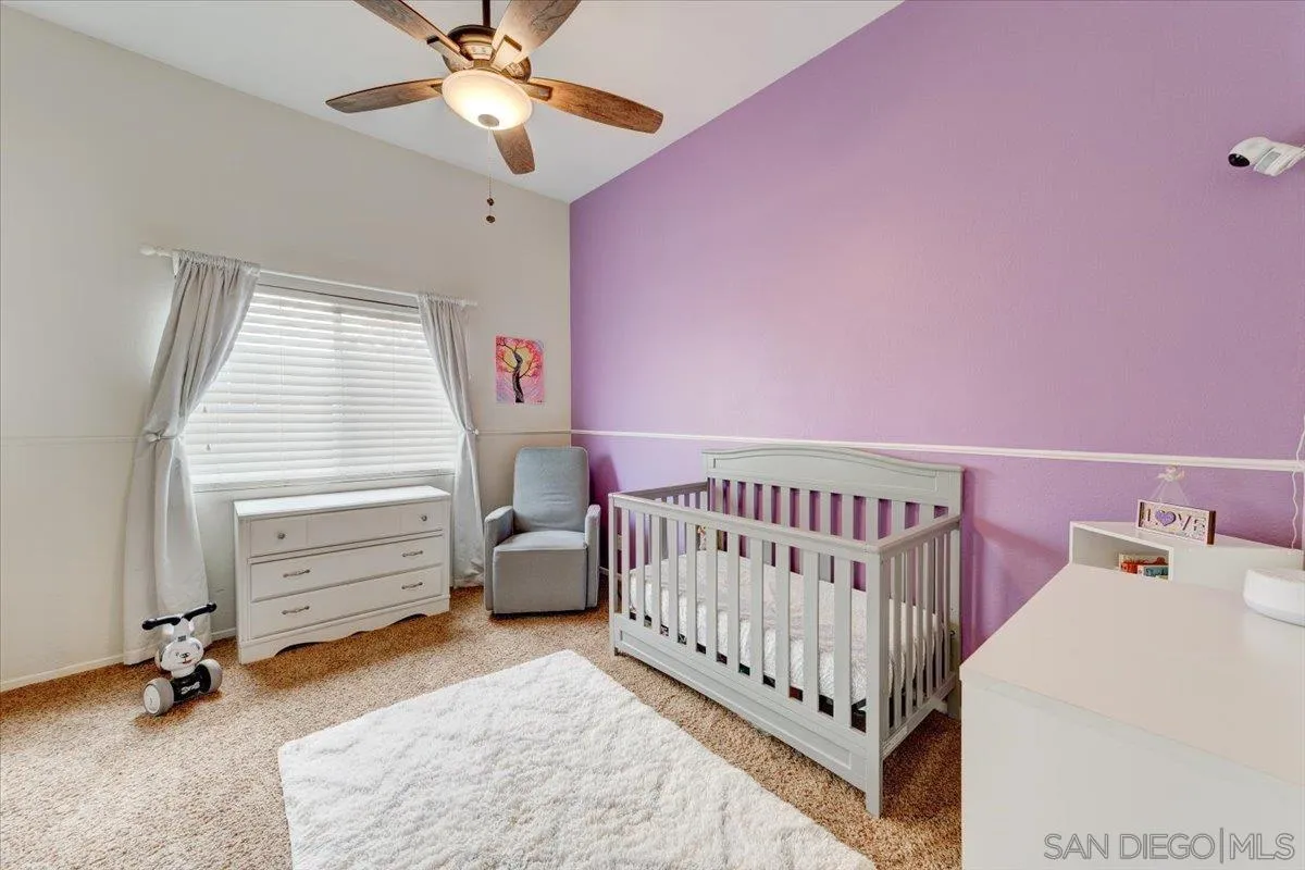 1359 H Street Ramona, CA 92065 - Photo 27 of 52 a view of a bedroom with furniture and a window