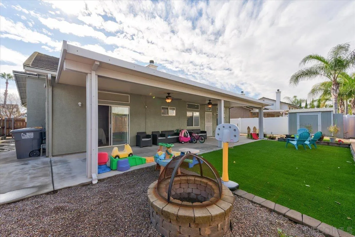 1359 H Street Ramona, CA 92065 - Photo 34 of 52 a view of a backyard with porch and furniture