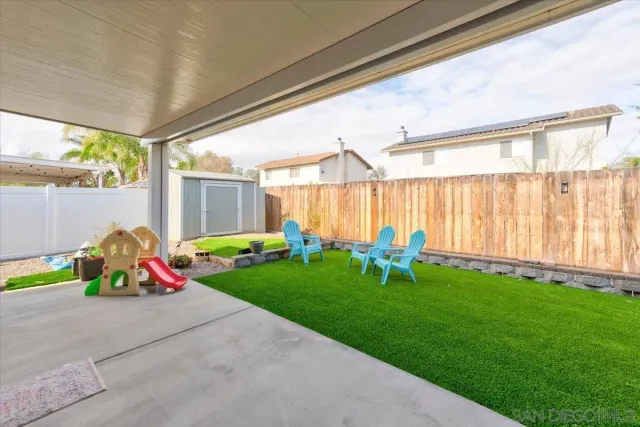 a childrens park with lots of swings and slides