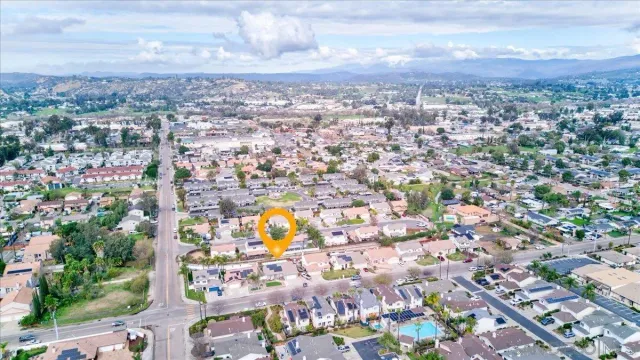 a aerial view of a house with a garden and plants