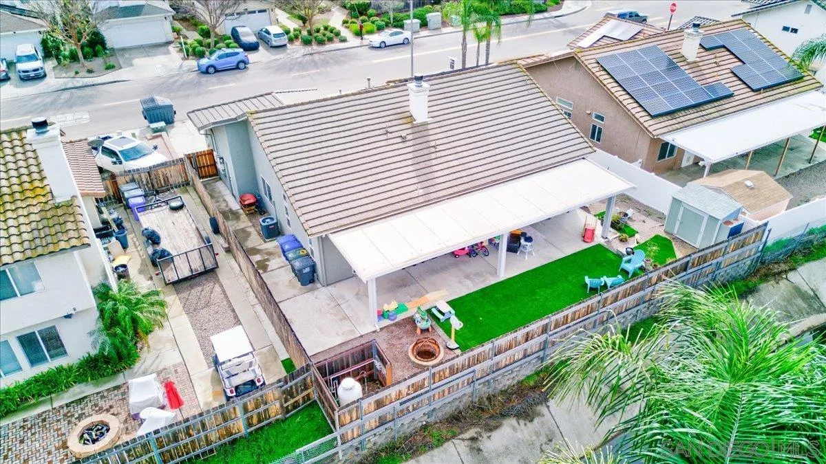 1359 H Street Ramona, CA 92065 - Photo 52 of 52 an aerial view of a house with a garden and trees