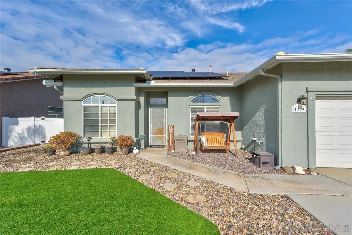 1359 H Street Ramona, CA 92065 - Photo 9 of 52 a front view of a house with garden