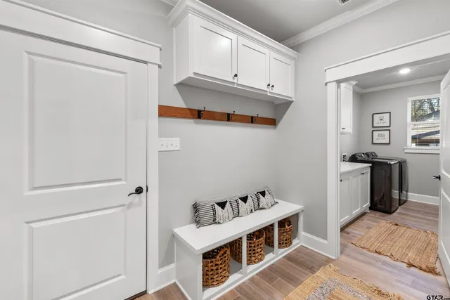 a view of kitchen with furniture and wooden floor