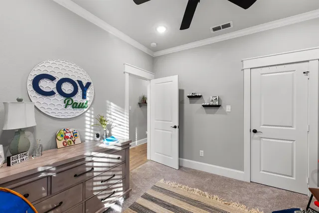 a very nice looking room with a dining table a rug