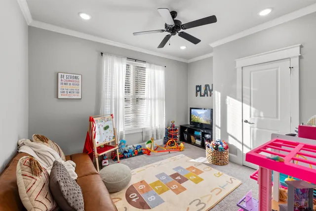 a bed room with furniture and a window