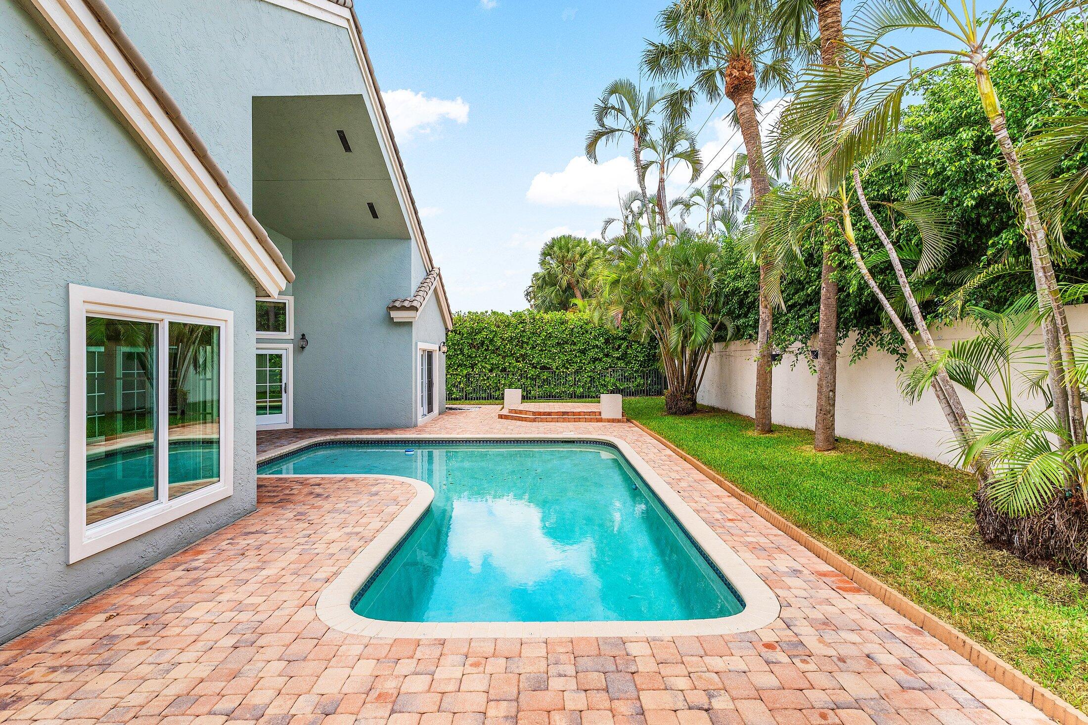 2599 Northwest 49th Street Boca Raton, FL 33434 - Photo 40 of 40 a view of swimming pool with a yard