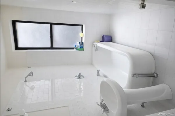 a bathroom with a bathtub