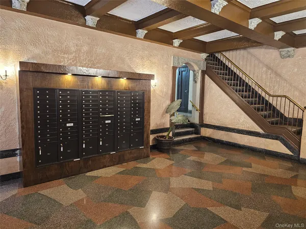 a view of an empty room with stairs