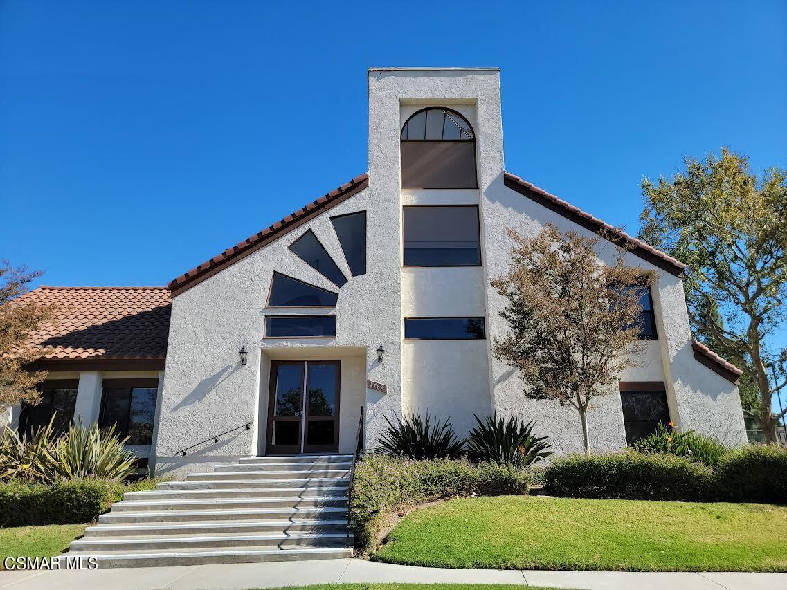1724 Sinaloa Road, Unit 127 Simi Valley, CA 93065 - Photo 28 of 35 a front view of a house with garden