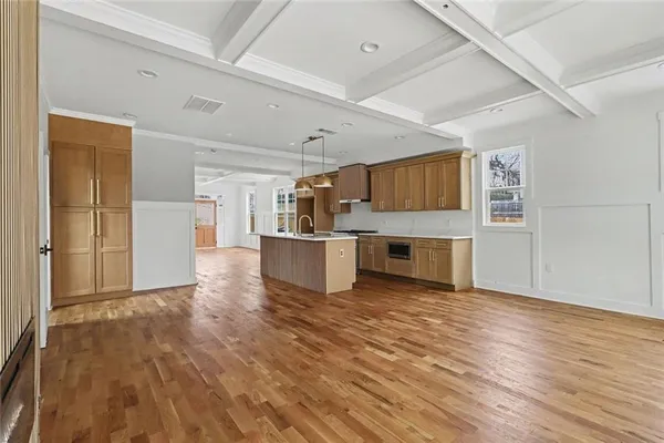 a view of a kitchen with a sink cabinets and a kitchen