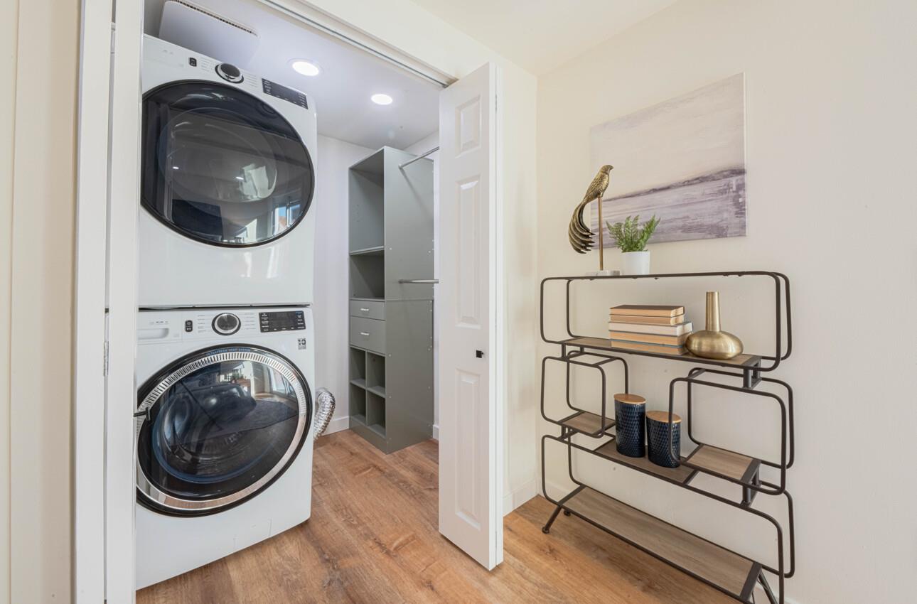 518 Cortes Street Monterey, CA 93940 - Photo 17 of 32 a view of a hallway with washer and dryer