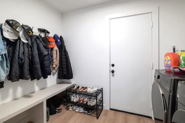 a view of a patio with a table chairs and a backyard