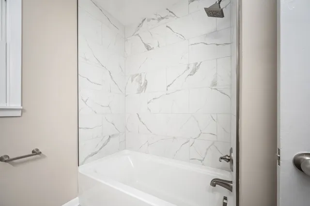 a bathroom with a bathtub