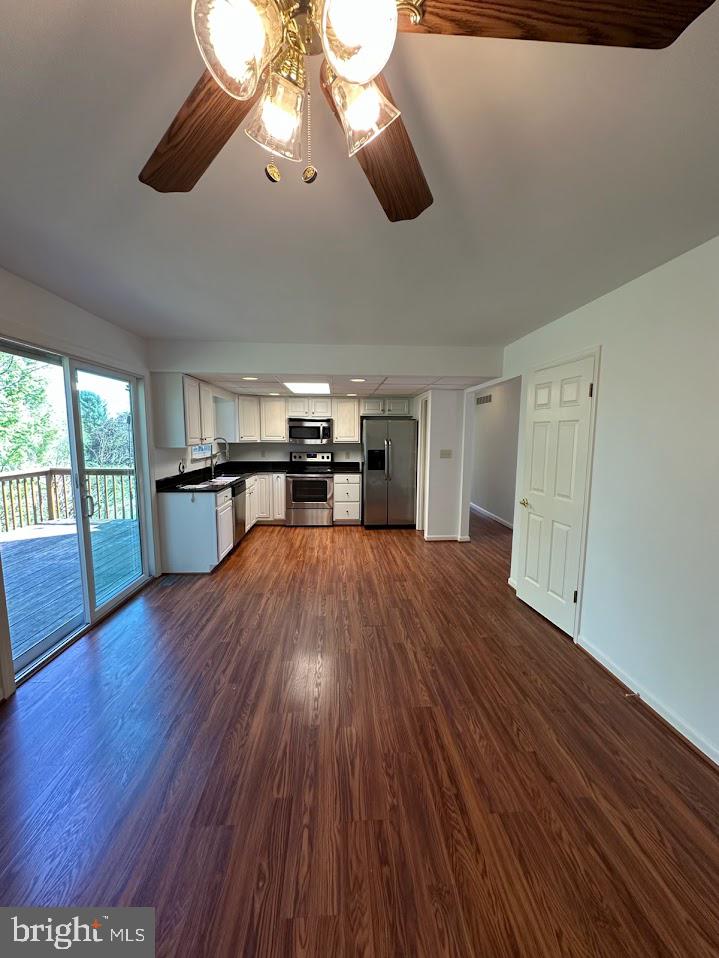 17904 Marshall Mill Road Hampstead, MD 21074 - Photo 2 of 10 a view of empty room with wooden floor