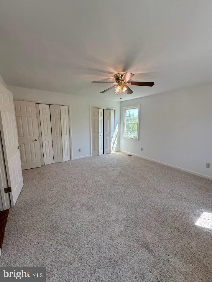 17904 Marshall Mill Road Hampstead, MD 21074 - Photo 3 of 10 a view of a livingroom with a chandelier fan