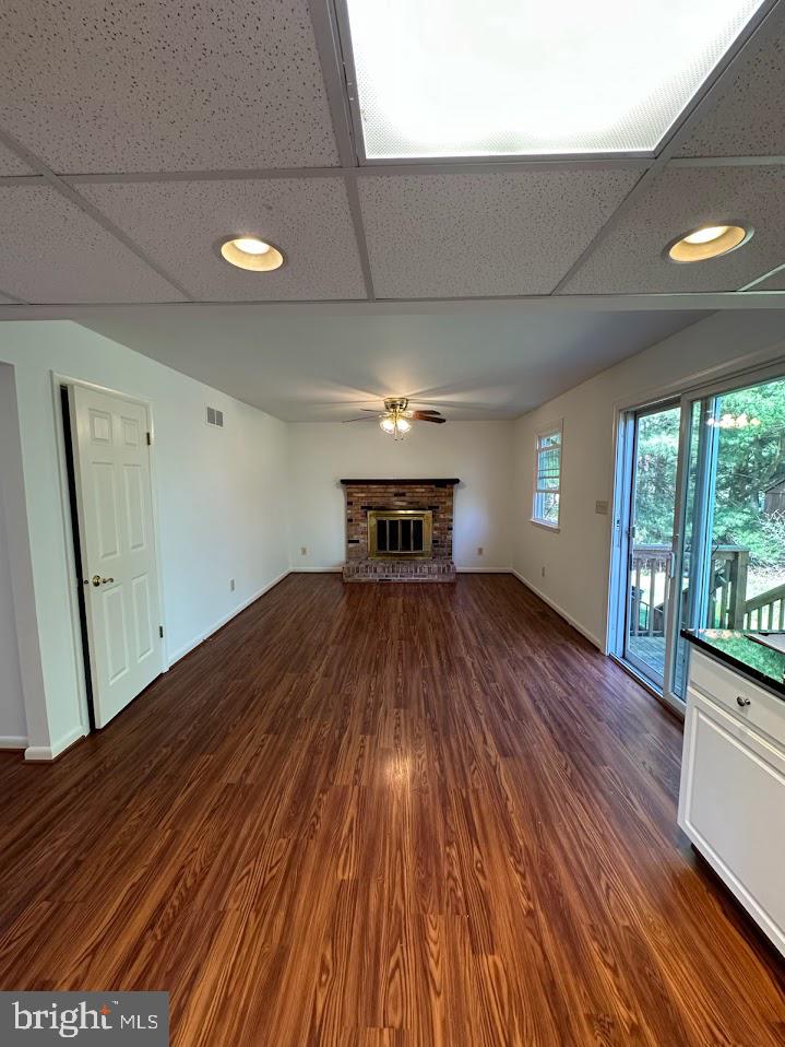 17904 Marshall Mill Road Hampstead, MD 21074 - Photo 5 of 10 a view of empty room with wooden floor and fan