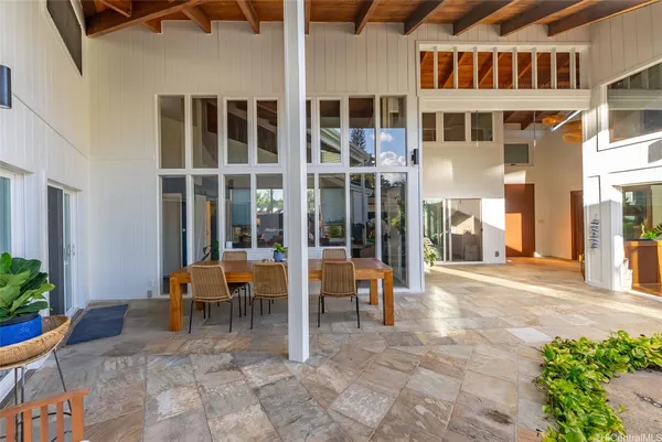 a view of a building with sitting area