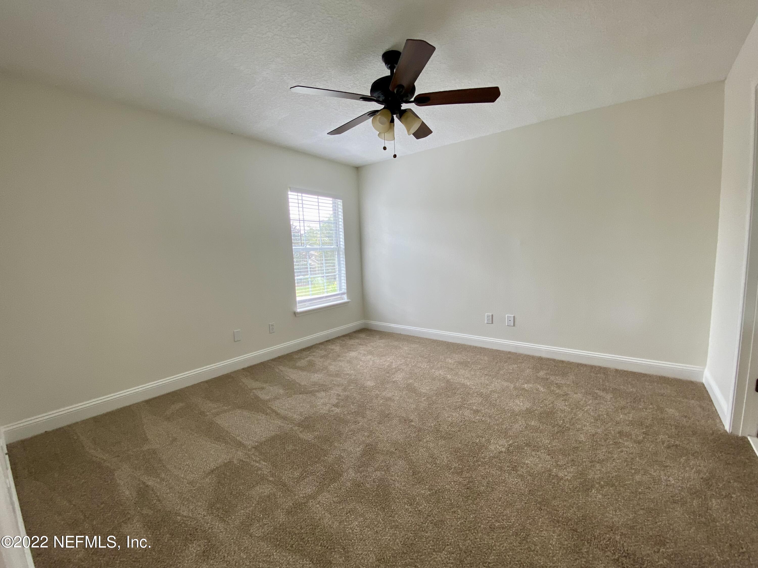 1648 Summerdown Way St. Johns, FL 32259 - Photo 14 of 14 a view of an empty room with a window